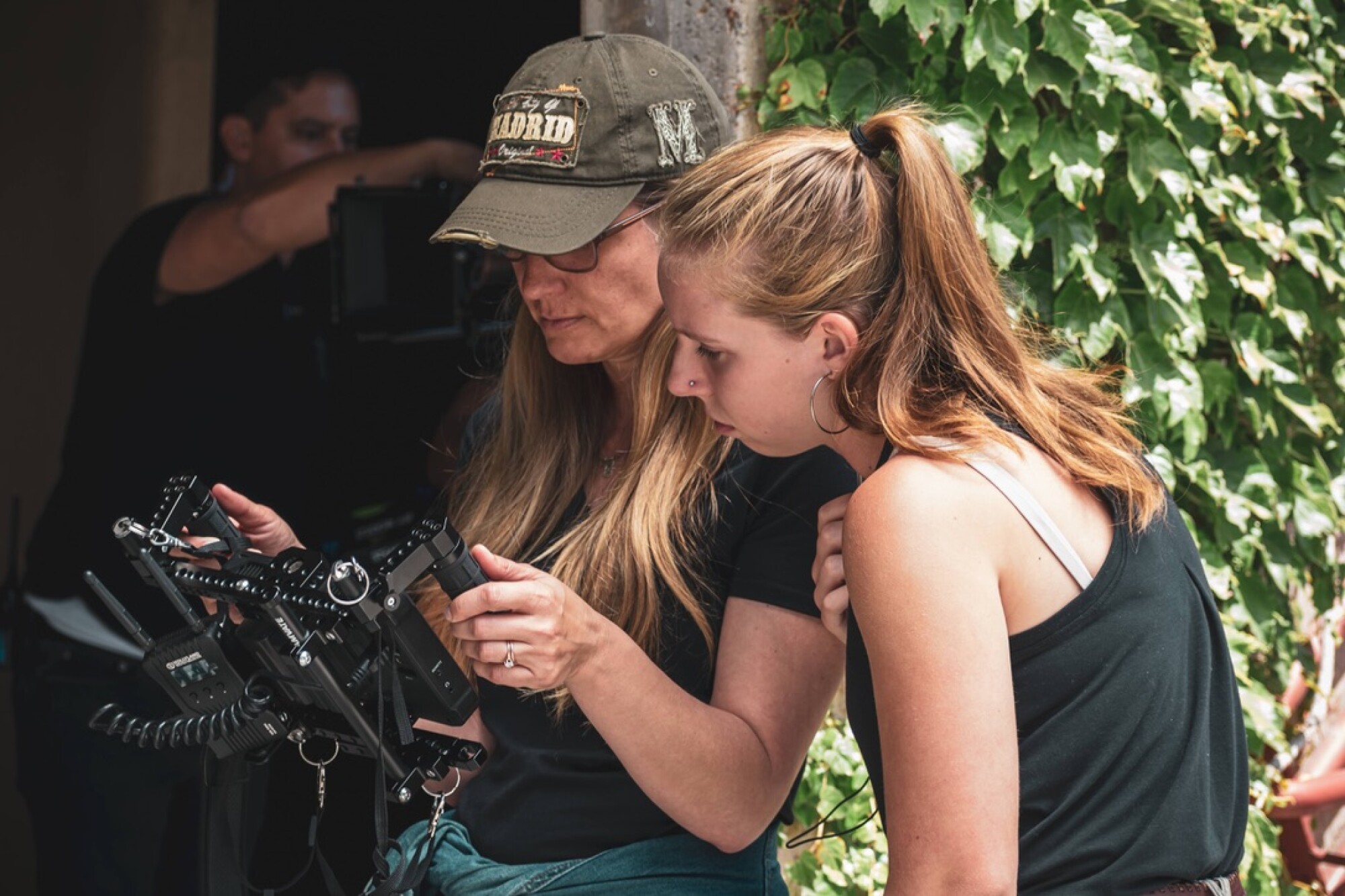 Director Maggie Marht (left) reviews a shot with Katie Gerlach during shooting of "O, Brawling Love!"